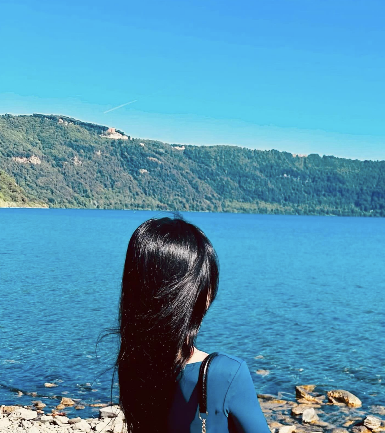 Stasia looking out over a lake